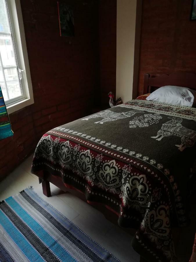Hostal La Casa Amarilla City 바뇨스 외부 사진