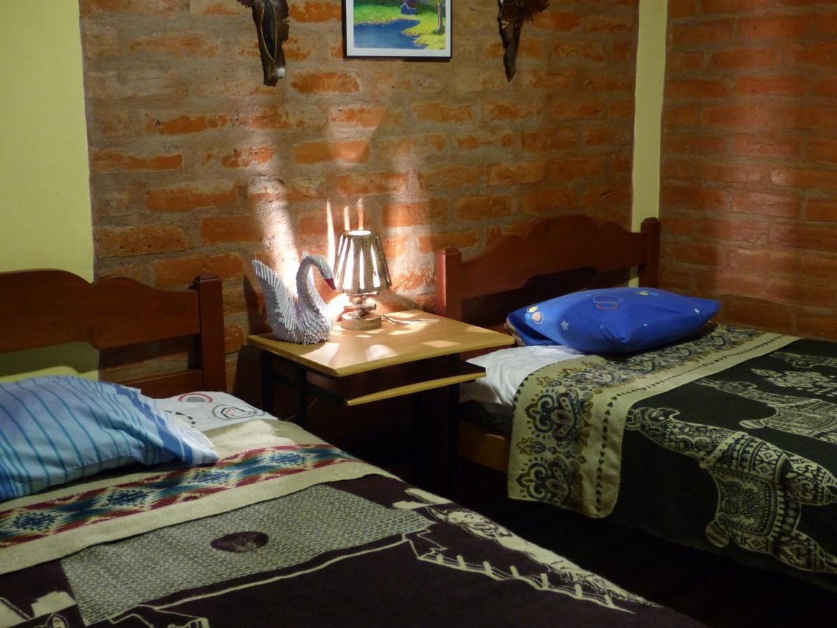 Hostal La Casa Amarilla City 바뇨스 외부 사진